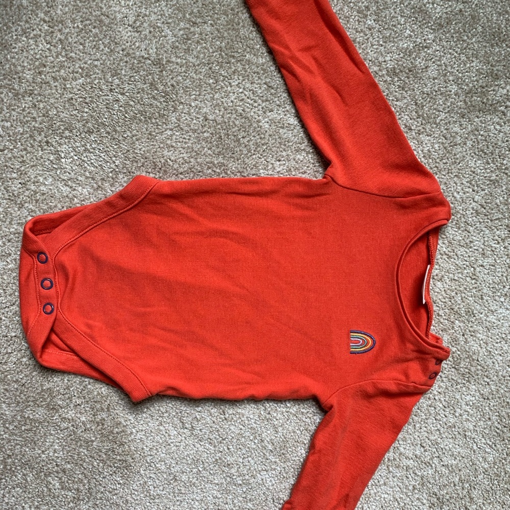 Next Direct onesie.